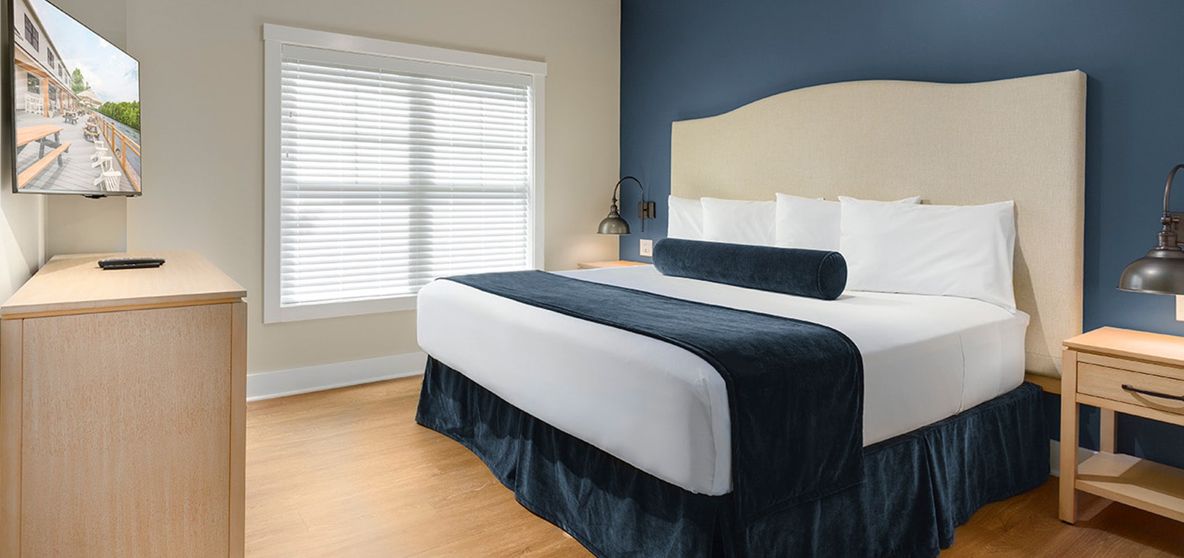 master bedroom in cottage at the cove at sylvan beach