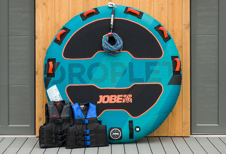 Tube with rope and life jackets on the deck - says Droplet Jobe