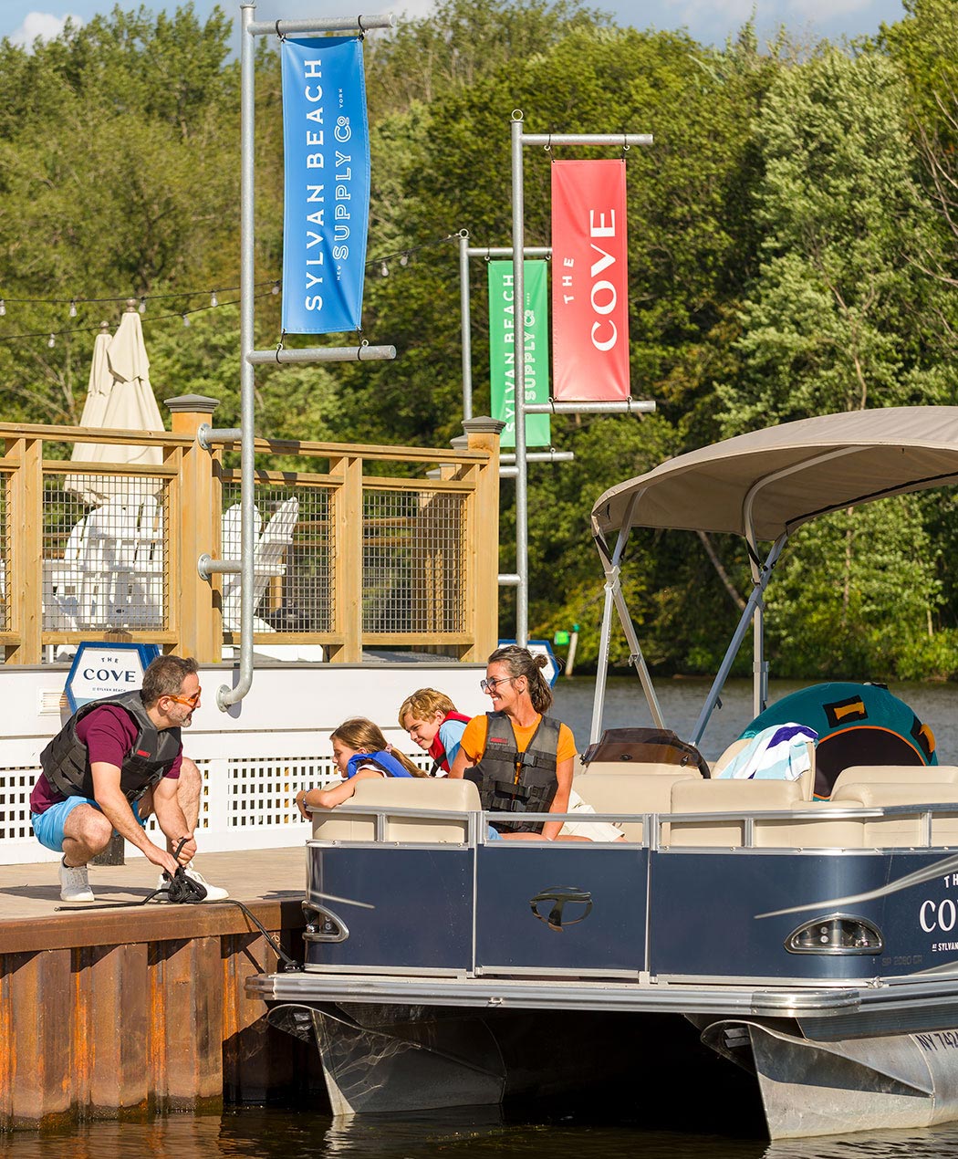 pontoon boats docked at the oneida lake