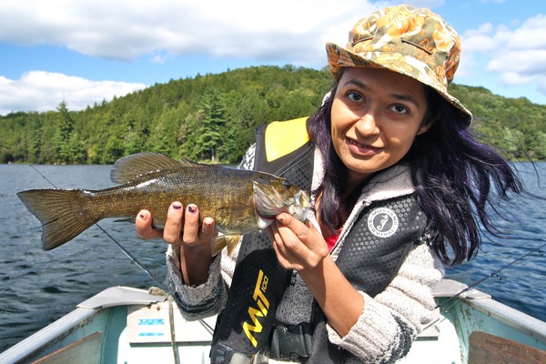Woman Poses With Smallmouth Bass