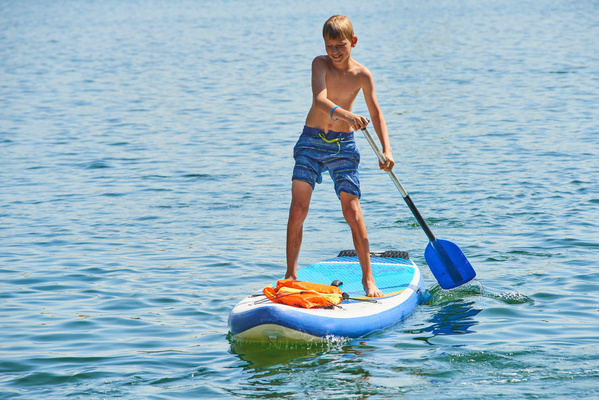 Child On Paddle Board