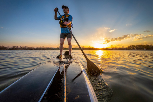 Man Paddle Boarding